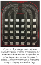 Figure 1: A prototype pattern for an interactive piece of cloth. We measure the interconnections between the patches to get an impression on how the piece is folded. The microcontroller is connected using a clipping mechanism (top)